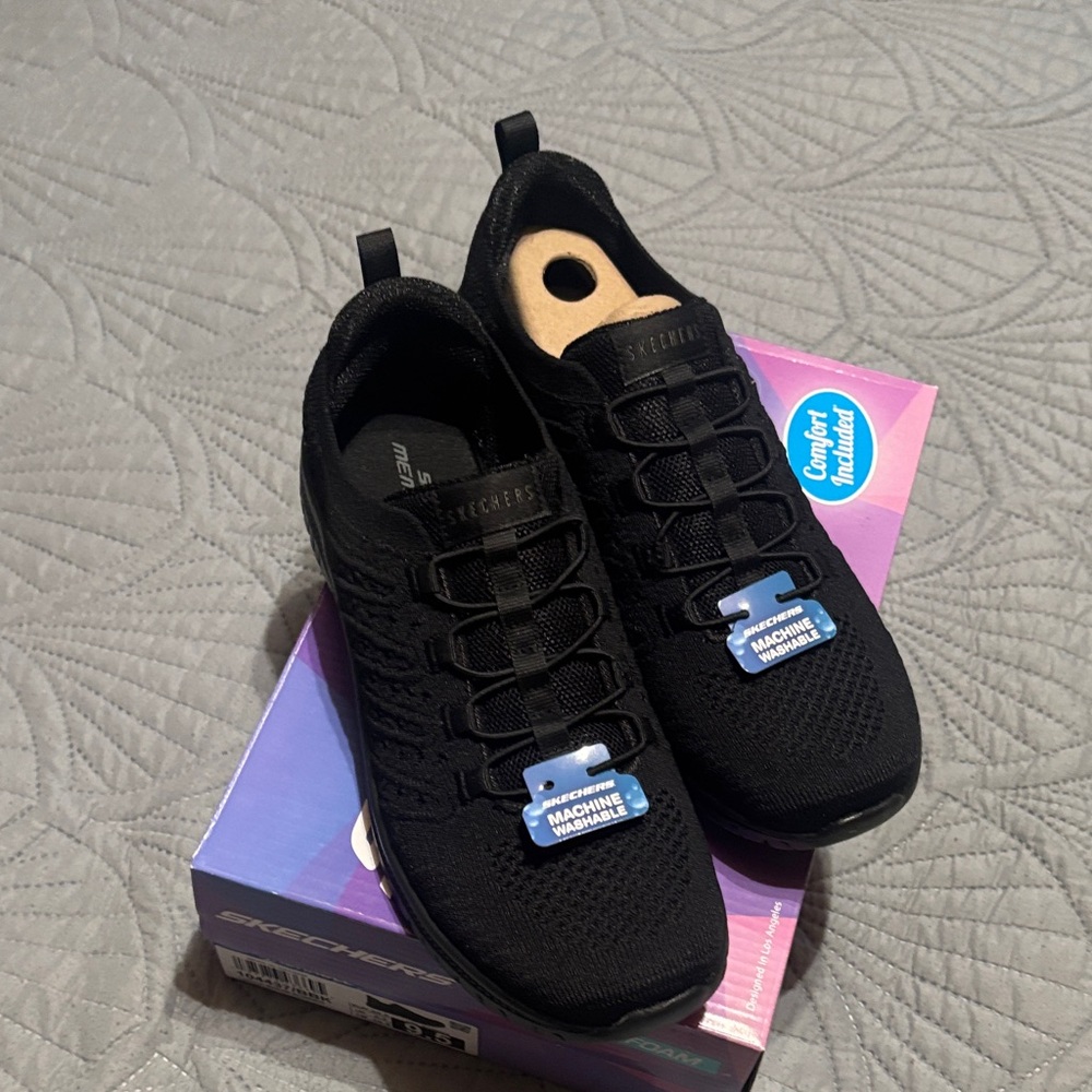 Skechers Woman’s Black Knit Slip-On Sneakers